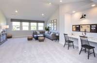 Huge Bonus Room. Great for watching movies! Photo is of similar floorplan, not actual home.