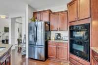 The kitchen refrigerator remains with the house.