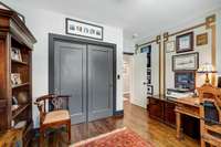 View of closets and entry door to bedroom #2