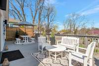 a large refinished back deck with privacy. Enjoy dinner al fresco and your morning coffee; perfect for entertaining