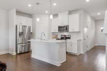 Step into the epitome of contemporary elegance in this stunning kitchen design with lovely hardwood floors! 1772 Tahoma Dr.   Lebanon, TN 37087