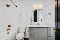 2nd Floor Guest Bedroom with Shower/Tub Combo, Tiled Surround, and Quartz Countertop