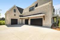 4 car attached garage with convenient exterior entrance doors to driveway