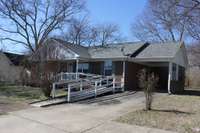 Attached Carport and Concrete Driveway