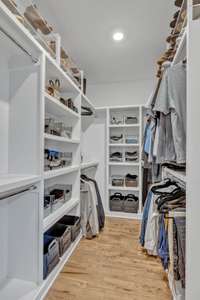 Wonderful built ins and plenty of storage in this expansive primary closet.