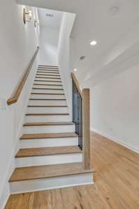 This back staircase leads to the third level of the home