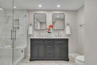 New luxury primary bath!!  Beautiful double vanity, recessed lighting and two closets!