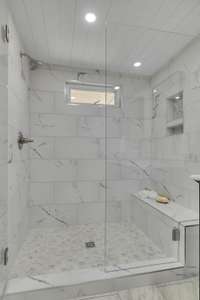 Massive tiled shower with glass enclosure!