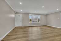 This is a view from the dining area looking toward the front door.  Notice how wonderful the natural light is!