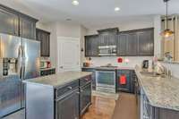 Great size kitchen with an island & pantry