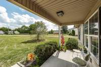 Enjoy your morning cup of coffee on the covered front porch.