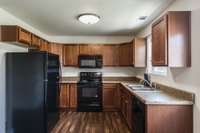 Beautiful kitchen with nice cabinets. All appliances remain including the washer and dryer!