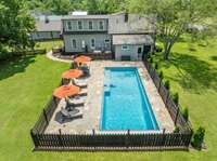 Brand new salt water heated custom pool with motorized pool cover, and of course the water has lights to change colors! There is even a private entrance to the pool area off of the primary bedroom. Plenty of room for family and guests poolside.