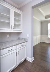 Butler's Pantry connecting Kitchen and Formal Dining Room. Similar floorplan, not actual home