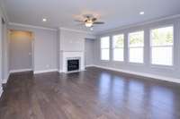 Great Room with lots of windows for natural light. Similar floorplan, not actual home