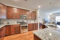 Granite and upgraded cabinets in kitchen