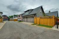 All Graymont homes provide alley entry garages and uniform red cedar privacy fencing