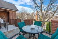 This home has multiple outdoor spaces. This is open terrace located to the left of the front porch.