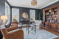 Perfect office set up with bookshelves and french doors.