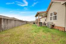 Enjoy complete privacy and peace of mind in the fully fenced backyard, now featuring a new gate. This secure space is perfect for both your furry friends to roam freely and for you to relax undisturbed.1327 Christine Dr.   Lebanon, TN 37087