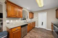 This eat-in kitchen with a built-in pantry features granite countertops and new laminate flooring for a modern flare! 1327 Christine Dr.   Lebanon, TN 37087