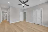3rd upstairs bedroom, also a suite (i.e. 3rd suite of the home). Multiple large walk-in closets. Large bathroom.