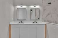 1st floor primary suite bathroom - dual vanities.