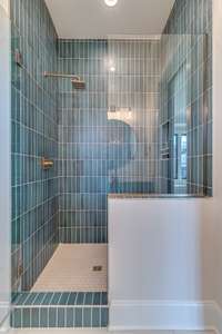 Bath 4 spa-like shower w beautifully tiled walls