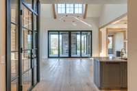 View of Conditioned Wine Room, Entertainer's Wet Bar and Impressive Great Room