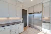 Prep Kitchen includes stainless steel- upright freezer (L) Refrigerator (R)