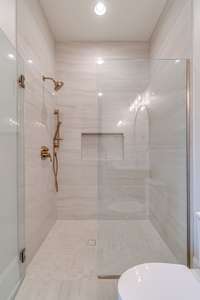 View of Guest Bath's curbless walk-in shower