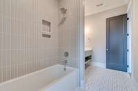 Bath 5 with beautiful tile wall