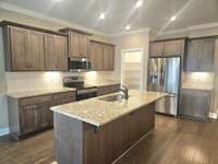 Nice open kitchen with stainless steel appliances