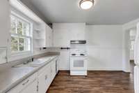 Imagine your newly renovated kitchen here with this gorgeous over the sink window!