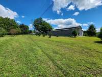 17 UNRESTRICTED ACRES!! Barndominium for 2 Br and 2 Other Rooms that Could be Bedrooms along with 1 Beautifully Designed Tile Bath.