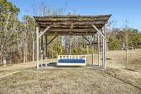 Take a rest or read a book during the lazy days of summer on this bed-swing.  Also (not shown) is a separate over-sized framed hammock to enjoy as well