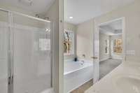 Master bath features garden tub and separate shower