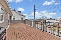 The rooftop deck offers a picturesque view of the neighborhood, providing an ideal setting for entertaining with its spacious layout and inviting atmosphere.6206A Morrow Rd  Nashville, TN 37209