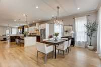 Inviting open floorpan with genuine white oak finished hardwood.