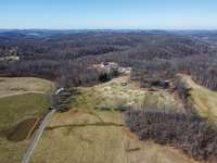 Another drone shot where you see a lot of Cannon County and Woodbury area; with the surrounding mountainous views, treed acreage; privacy you cant find just anywhere.