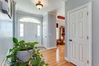 AWWWW! The entrance foyer to this fabulous home with hardwood throughout makes you glad you walk in the front door; with 9' ceilings in the primary rooms, closets throughout.