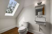 Half bathroom with skylight on the third floor