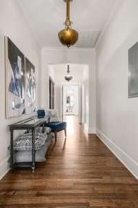 Second floor hallway with beautiful custom lighting