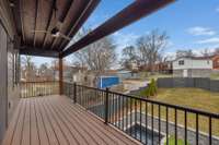 The outdoor spaces with Trex decking overlooking the pool and huge backyard.