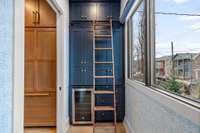 Appliance, beverage, and pantry storage with pocket door if you prefer hidden storage.  We always love a pantry with a view!