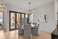 Dining has an alfresco option with accordion glass folding doors