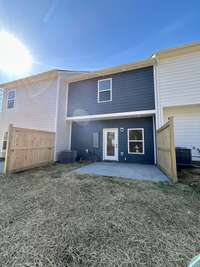 Spacious back patio area perfect for your back yard BBQ set up!