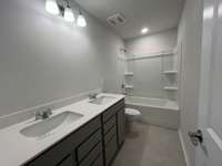 Hampton Home # 161 - Upstairs Bathroom 2 with 4 shelves, 2 sinks, plenty of storage for sharing.