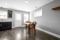 The dining room is open to both the living room and kitchen!