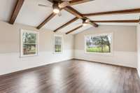 Large family room with vaulted ceilings.